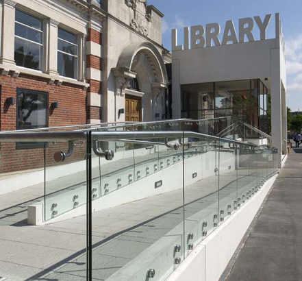 Contemporary glass and stainless-steel balustrading, blending with the traditional listed library building Contemporary glass and stainless-steel balustrading, blending with the traditional listed library building