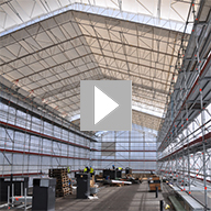 Video of the UBIX Temporary Roof installation using the RUNWAY method, where the roof is installed from a safe working platform and 'pushed' out.
