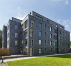 Cladding support systems for housing regeneration