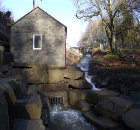 Switched on Stone Firms celebrates new micro hydro generation turbine
