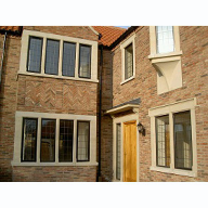 Cast stone window and door surrounds: standard and bespoke