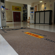 Entrance matting for the home of the Harlequin