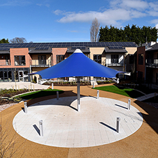 Tensile canopy for retirement complex