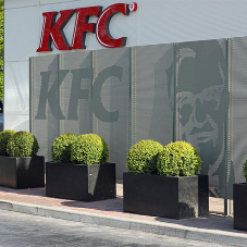 Perforated metal screens for KFC drive thru