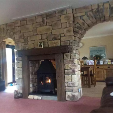 Cast sandstone wall cladding for fireplace