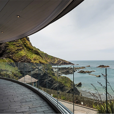 Elegant glass balustrade for coastal wedding venue