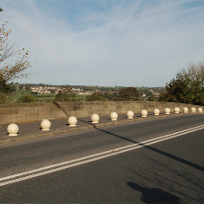 Recycled spherical bollards over The River Aire