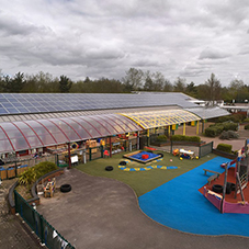 Covered playground extension in Church Langley