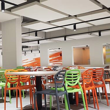 ACUSTIART absorbing panels create relaxing canteen area for workers and customers