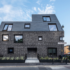 CUPACLAD is the logical choice for striking leaning housing block
