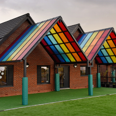 Unique Broxap rainbow canopies for Swindon Primary School