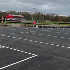 Fast, durable resurfacing for parking area at go-kart track