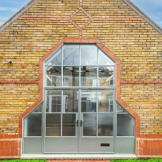 Bespoke, statement double door screen creates one fantastic entrance