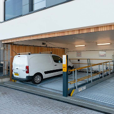 Side sliding garage door benefits stack up for parking lifts Side sliding garage door benefits stack up for parking lifts