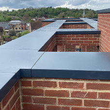 Skyline Architectural Aluminium Copings from Alumasc – Stylish Protection for Parapet Walls