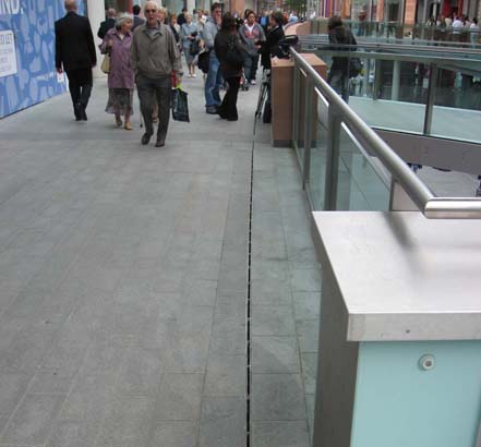 The ACO drainage system removes rainwater efficiently and quickly, ensuring the surface is safe for shoppers
