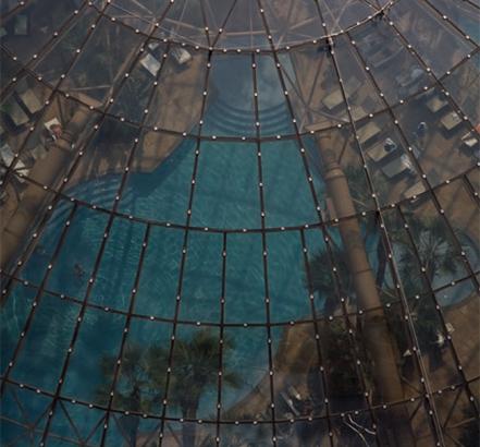 The transparent dome ensures a naturally lit pool area