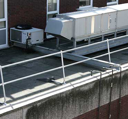 The guardrail provides fall protection for the roof