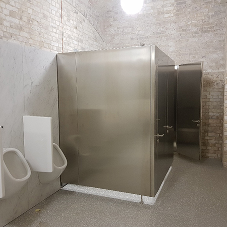 Brushed stainless steel cubicles at Royal Academy of Arts