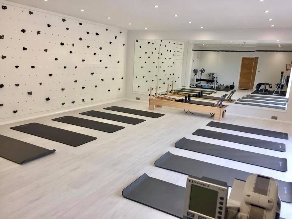 A sleek, sophisticated theme for this Fitness and Pilates studio