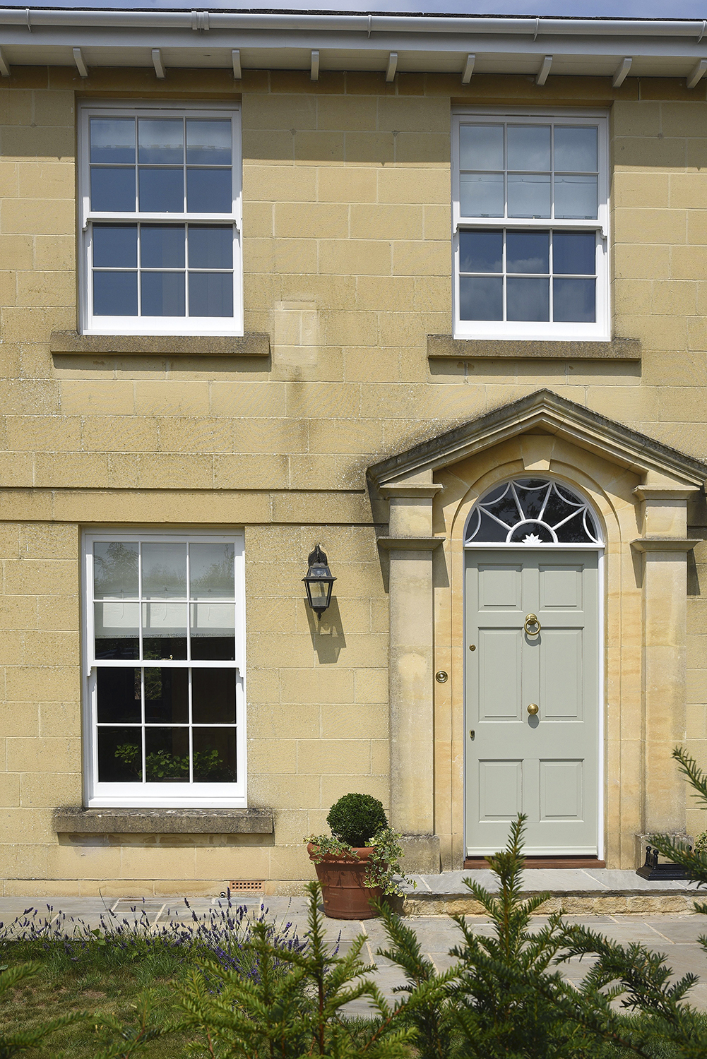 Mumford & Wood install sash windows to suit stone architecture