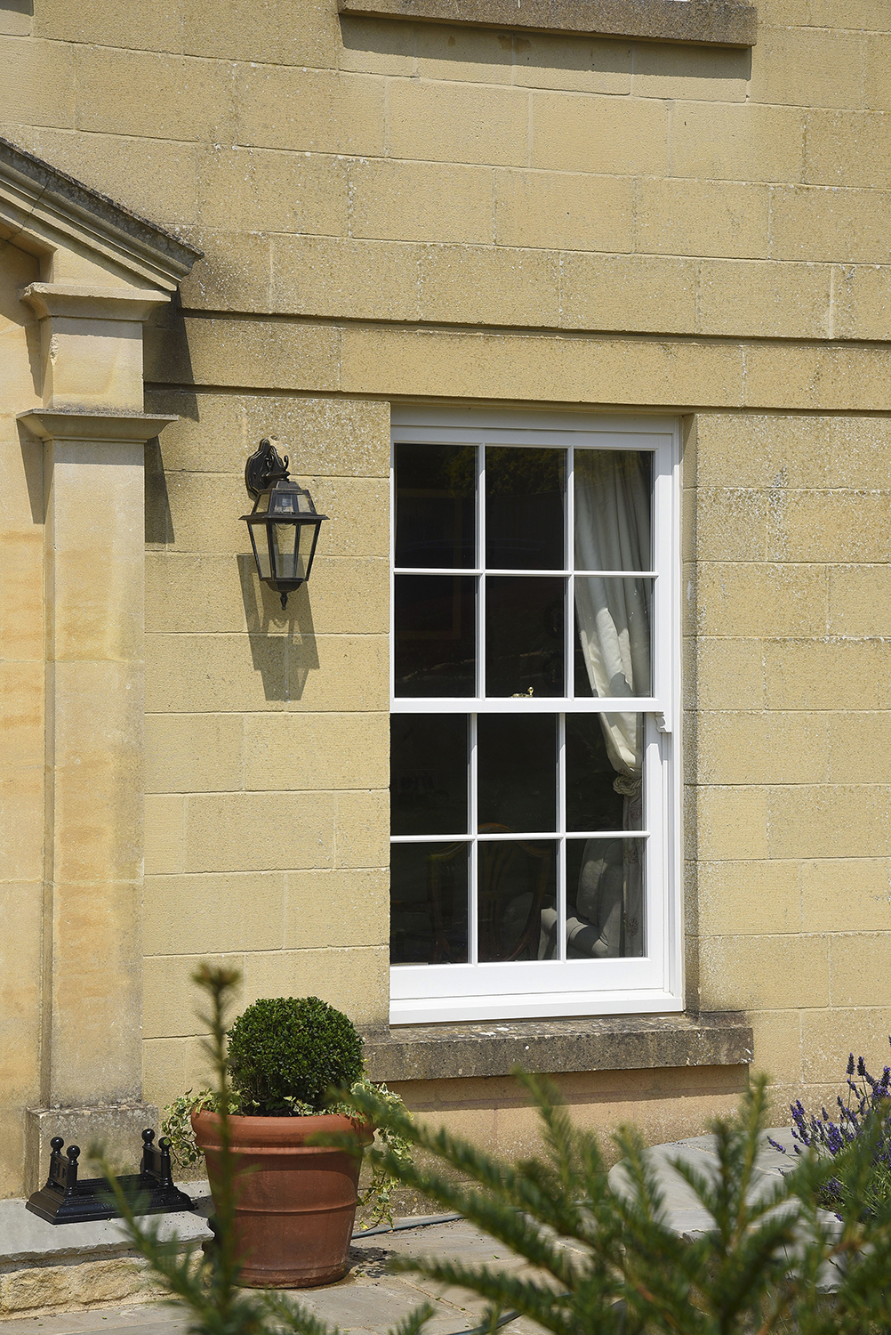 Mumford & Wood install sash windows to suit stone architecture