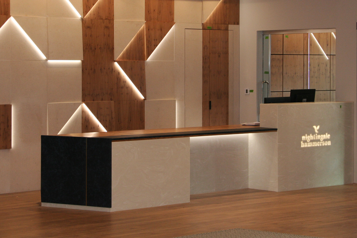 Hammerson House Reception Counter with Veneered Panel Wall Feature