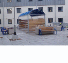 Co-ordinated Street Scene with FalcoTondo shelter, Swing benches and Topazio planters