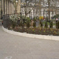 Stone kerb units around public park perimeter