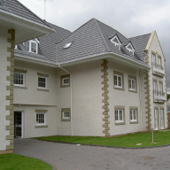 Cast stone copings, quoins and window surrounds