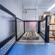 Low-rise platform goods lift for split-level storeroom