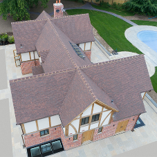 Handmade clay tiles create historic-style new build