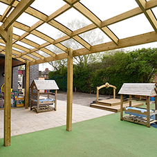 Timber play equipment and canopy for St Catherine's