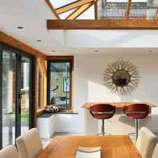 Oak orangery with modern bi-fold doors