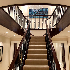 Bespoke mahogany and wrought iron staircase