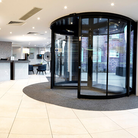 Revolving entrance for guests at elegant DoubleTree Hilton