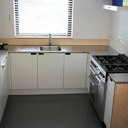 Stainless steel surfaces create family hub for kitchen