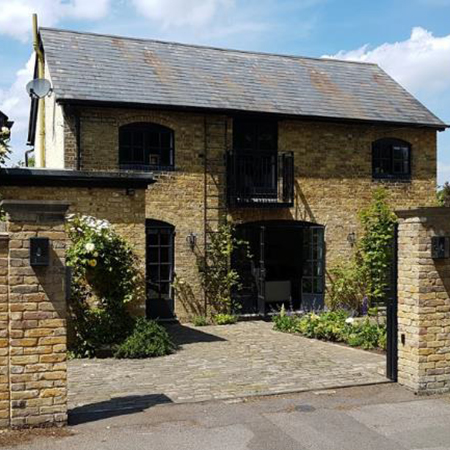 Coach house transformed into home with Clement steel doors and windows