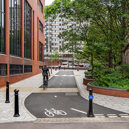 Charcon rides ahead of the kerb for Bristol City’s cycle scheme