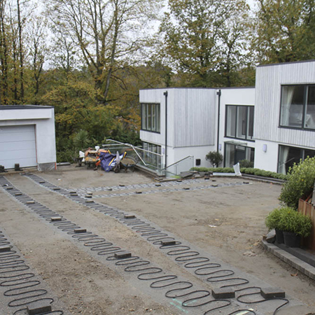 Heated driveway mats with block paving for luxury private home