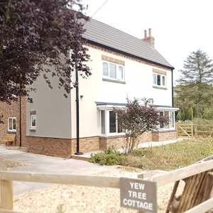 Johnstones render system rejuvenates ramshackle cottage