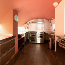 GEC Anderson crafts stainless steel kitchen within crypt of French Protestant Church