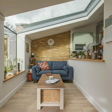 Stunning frameless Eaves rooflights take centre stage in this modern kitchen