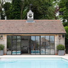 A Clement steel door screen chosen for this ‘dream’ pool house