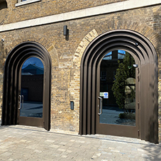TORMAX concealed door drive creates timeless automatic entrance