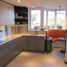 GEC Anderson Stainless Steel Splashbacks used to good effect in Curvy Kitchen