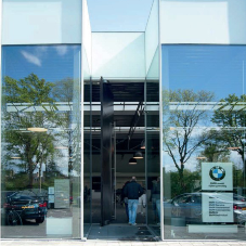 Bespoke Tall Pivot/Balance Door. Van Laarhoven BV, BMW Dealer, Eindhoven, The Netherlands