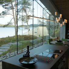Structural glazing brings wild nature and luxurious comfort together at Norwegian summer retreat