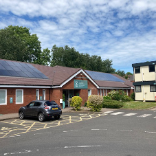 Introducing Solar Panels to an Operational Outpatients Building with Minimal Disruption