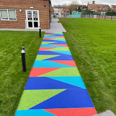 Bright Beginnings for this school with new colourful resin bound recycled glass pathways